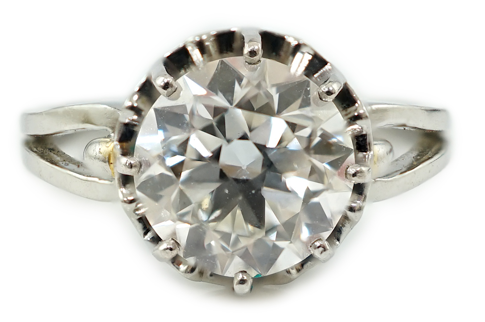 A platinum and solitaire diamond set ring